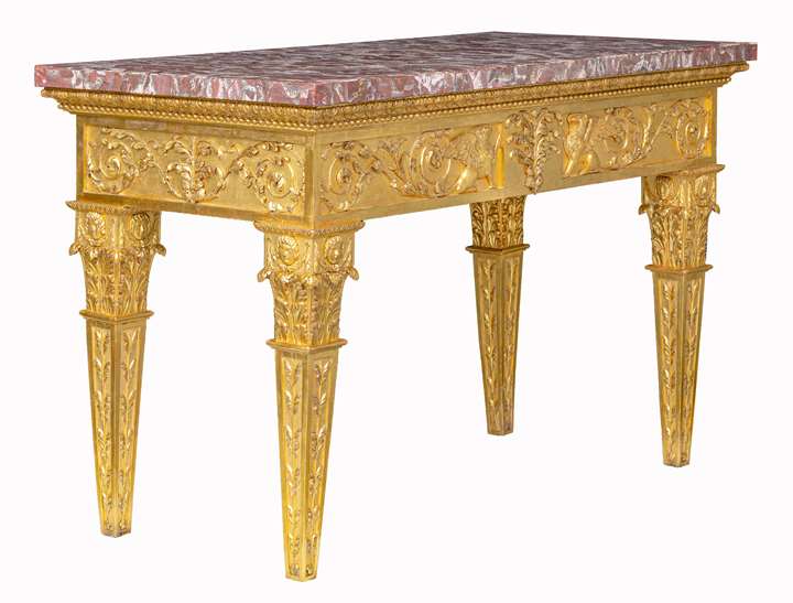 An Italian carved and giltwood neoclassical Console table, with a rectangular peperino top with Roman ancient alabastro a pecorelle veneer